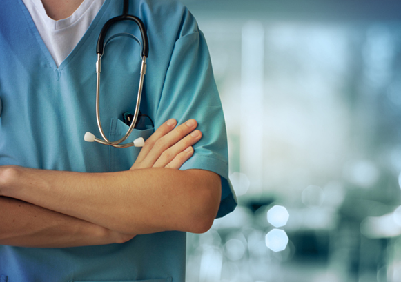 A medical worker crossing his arms