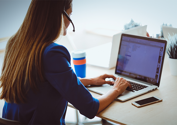 Woman looking at a laptop