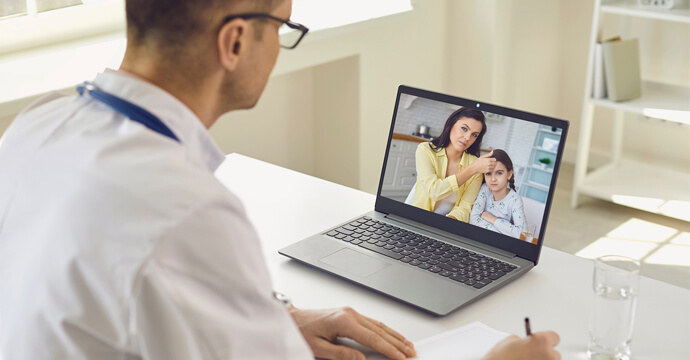 Video call between a doctor and his patient