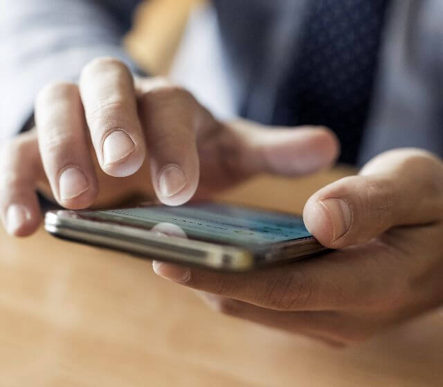 Someone holding a phone