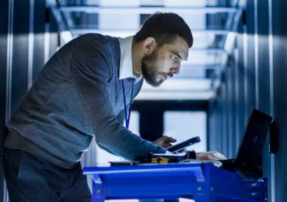 Man looking at a desktop