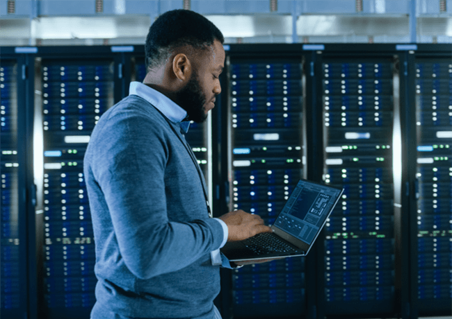 Man working in a server room
