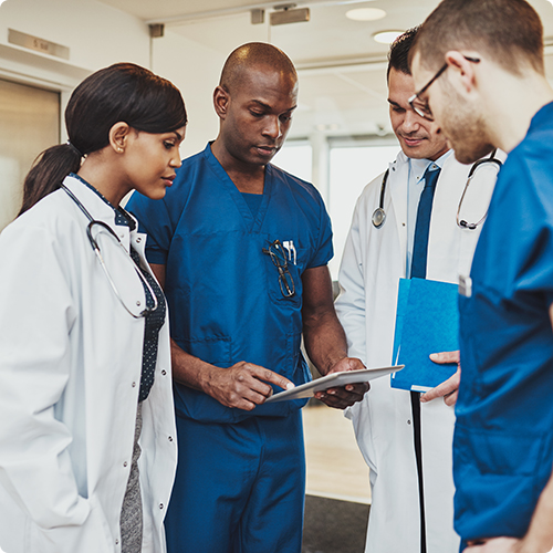 group of doctors and nurses talking