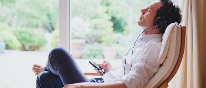 Someone listening music a on chair