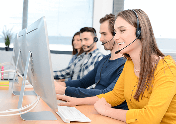 Multiple people working in a call center