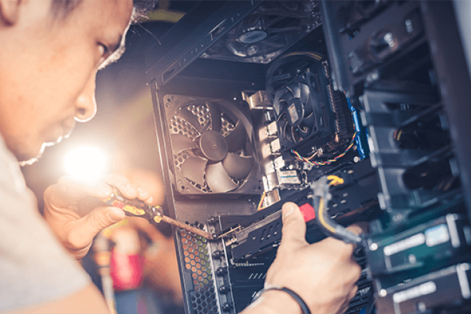 Someone repairing a computer