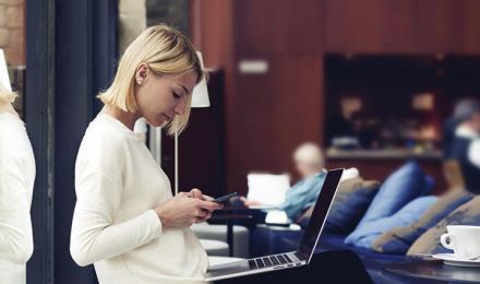 A woman looking at her phone