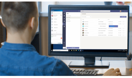man looking at his desktop