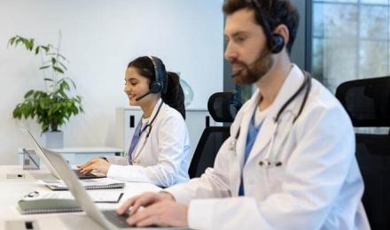 two medical persons calling