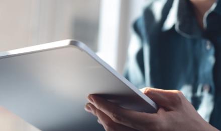 Woman hands holding a tablet