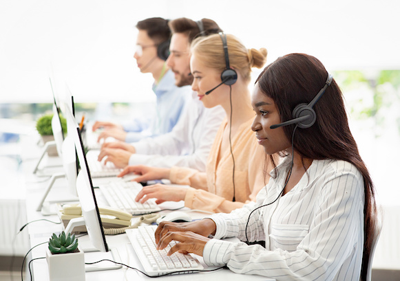 Multiple people working on a contact center