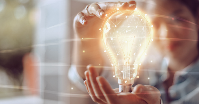 Woman holding a bulb