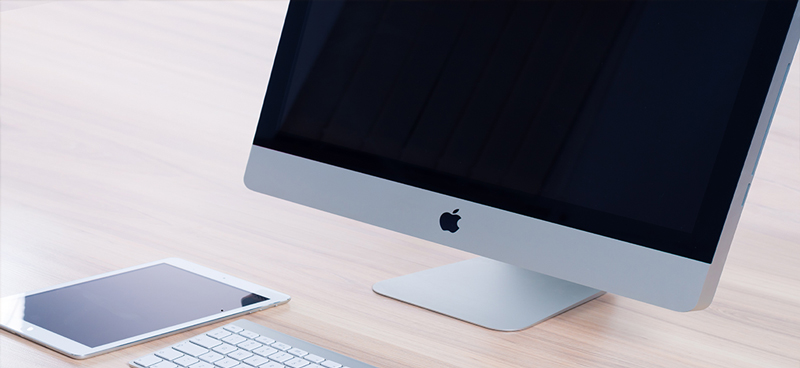 A Mac computer and a tablet