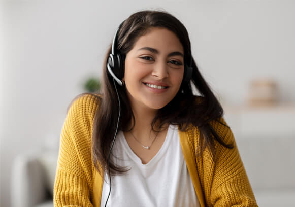 A woman on the phone with her headset