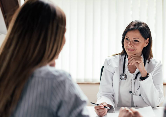A doctor and her patient talking