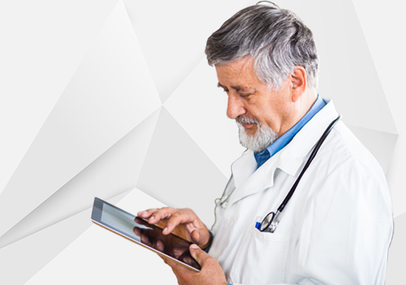 A Doctor looking at his tablet