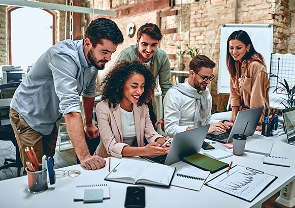 People working together around a desk