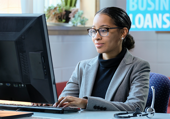 Woman looking at a monitor