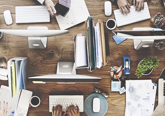 A vertical vision of a desk with equipments 
