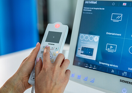 Hands using a HiMed device