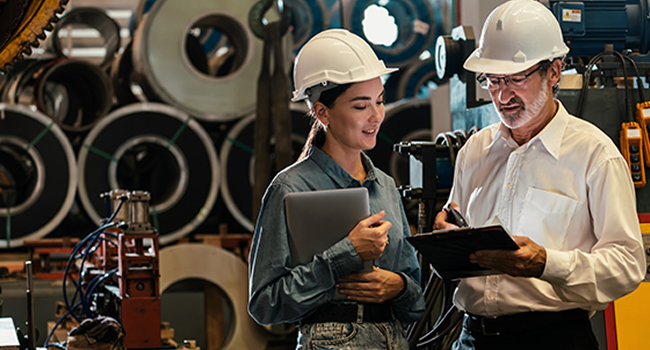 Two persons talking in a building