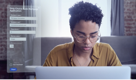 A woman in front of her laptop